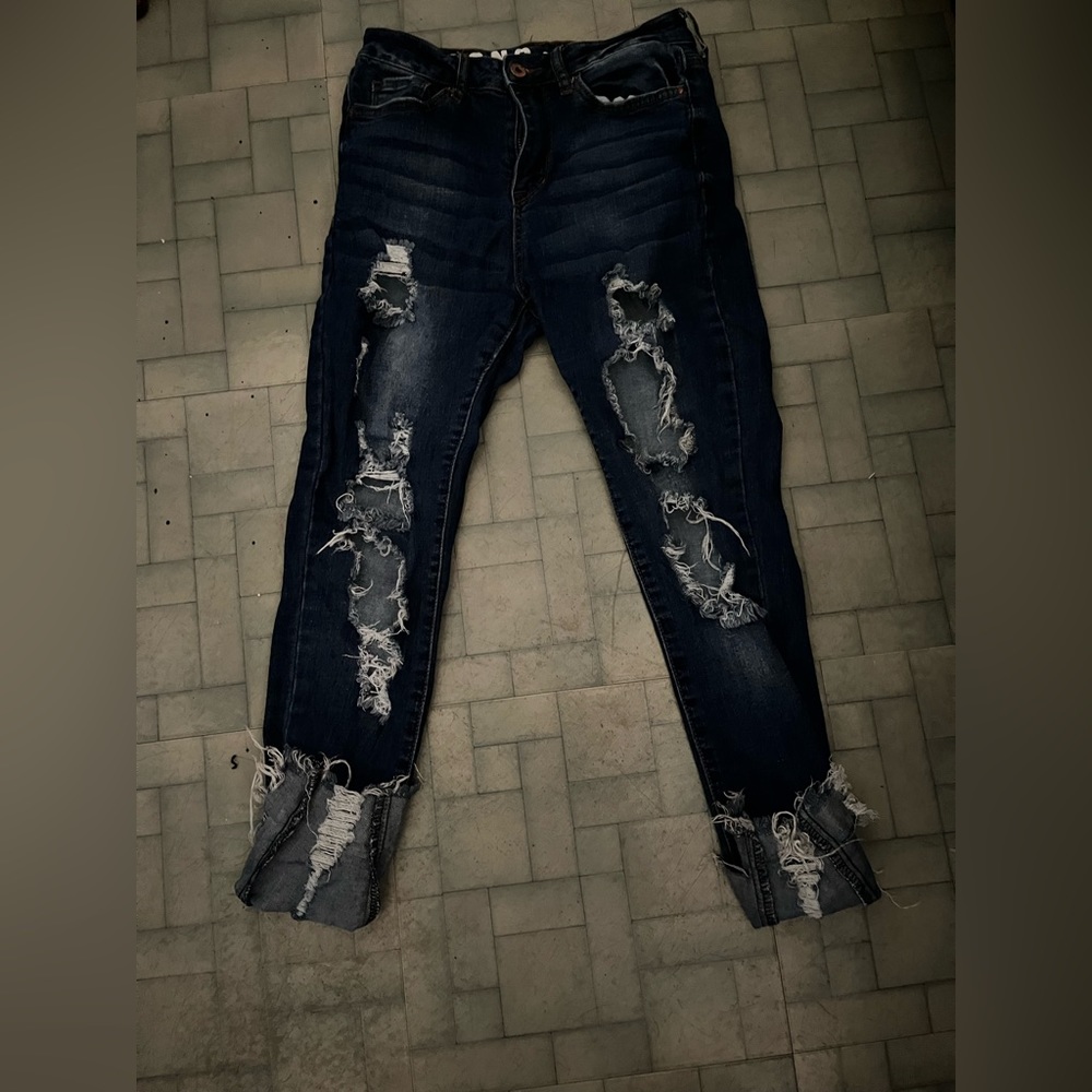 dark blue ripped jeans